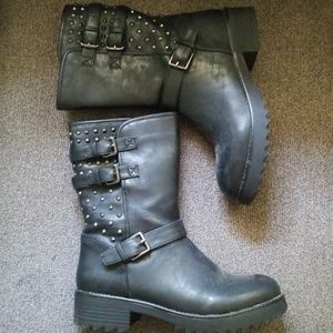 Black boots with spikes and strap.